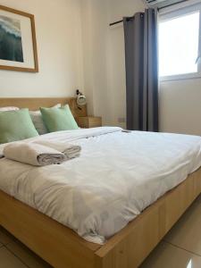 Postel nebo postele na pokoji v ubytování Gallery Apartment