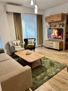 Posezení v ubytování Titik Apartments Mavrovo