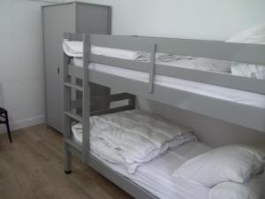 Postel nebo postele na pokoji v ubytování la maison ossaloise 6 people