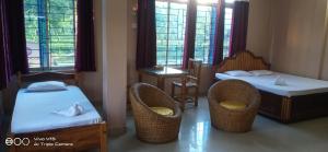 Giường trong phòng chung tại Ekora Resort