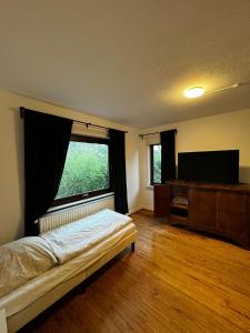 Voodi või voodid majutusasutuse Modern Nine toas