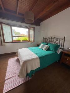 Postel nebo postele na pokoji v ubytování Casa La Campurra Selnatur