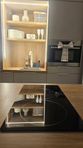 a kitchen with a sink and a counter top at Paradiso de Playa LaMata in La Mata +21 photos