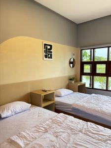 Postel nebo postele na pokoji v ubytování druma Roomstay