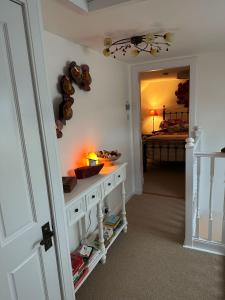 a room with a table and a room with a bed at Sealladh Sona in Inverness +36 photos