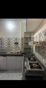 Køkken eller tekøkken på Anand stay