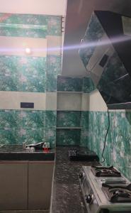 Køkken eller tekøkken på Anand stay + 6 billeder