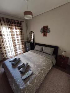 En eller flere senge i et værelse på The Cozy Haven