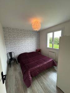 En eller flere senge i et værelse på Gite Vintage 63 Le Hameau 1936