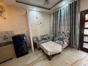 Posezení v ubytování Golden nest BNB