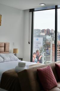 Postel nebo postele na pokoji v ubytování Seis Residences + 48 fotografií