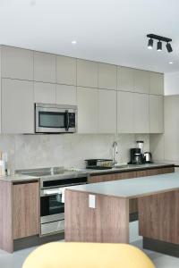 Kuchyň nebo kuchyňský kout v ubytování Seis Residences