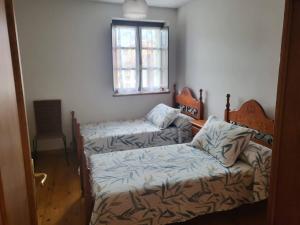 Postel nebo postele na pokoji v ubytování Apartamento La Magdalena