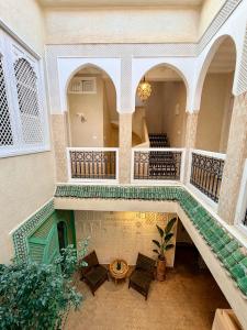 an overhead view of a building with a staircase at Riad El Badun in Marrakesh