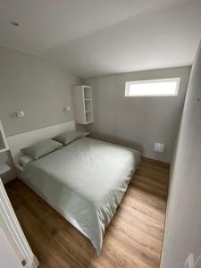 Postel nebo postele na pokoji v ubytování Appartement Oisterwijk