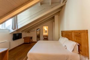 Postel nebo postele na pokoji v ubytování Art Hotel Varese