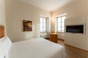 TV a/nebo společenská místnost v ubytování Art Hotel Varese