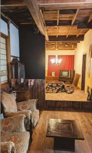 Posezení v ubytování CASA DE YOSHi 別館Annex,