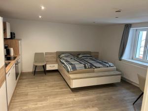 Postel nebo postele na pokoji v ubytování Schwarzwald-Apartments-Vogel