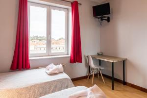 Μια τηλεόραση ή/και κέντρο ψυχαγωγίας στο Hostal La Concha en Somo +96 φωτογραφίες