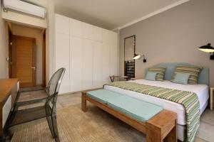 Postel nebo postele na pokoji v ubytování Royal park Balaclava Villa + 10 fotografií