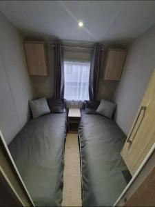 Ένα ή περισσότερα κρεβάτια σε δωμάτιο στο Willerby