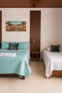 Postel nebo postele na pokoji v ubytování Hotel Wiky House, antes la casona de Wiky + 82 fotografií