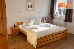 Postel nebo postele na pokoji v ubytování Pension Zum Hexenstieg