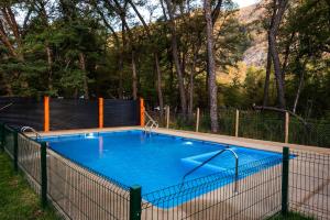 Bazén v ubytování Cabañas Las Trancas El Shaddai nebo v jeho okolí