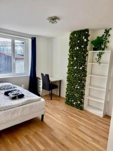 Ένα ή περισσότερα κρεβάτια σε δωμάτιο στο Maison au coeur du Sidobre