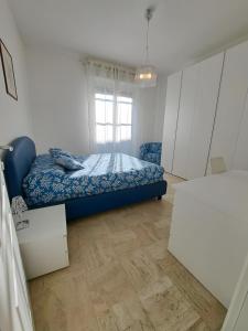 Una cama o camas en una habitación de Casa Gaia 6 fotos más