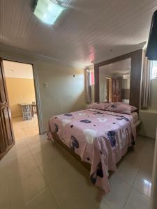 Postel nebo postele na pokoji v ubytování Residencial Silvas AP 01