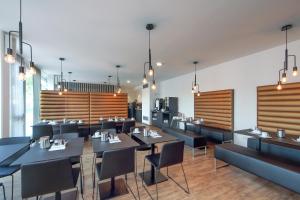 A restaurant or other place to eat at Design & Lifestyle Hotel Estilo