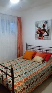 Ένα ή περισσότερα κρεβάτια σε δωμάτιο στο Two-Bedroom Apartment K3I at Infiniti Blu