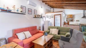 Khu vực ghế ngồi tại Casa de la Montaña El Borge by Ruralidays