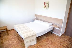 Uma cama ou camas num quarto em Central flat very close to the beach in Eraclea