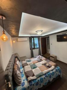 Postel nebo postele na pokoji v ubytování Guest House MARAVILA