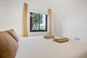 Postel nebo postele na pokoji v ubytování Oasis Duna Casa Maho + 26 fotografií