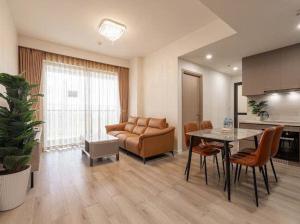 a large living room with a couch and a table at Vinhomes Grand Park 2 PN Masteri Centre Point view Công viên in Long Bình +28 photos