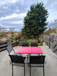 En balkon eller terrasse på La Mésange