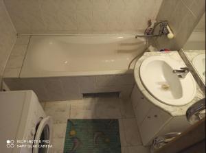 Koupelna v ubytování Apartamentas