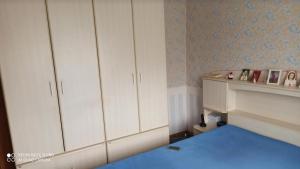 Postel nebo postele na pokoji v ubytování Apartamentas