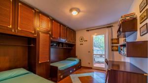 Køkken eller tekøkken på Villa Il Tramonto Bordo Costa - Goelba + 27 billeder