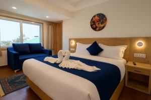 Postel nebo postele na pokoji v ubytování Bummy's by Vyaana Retreats