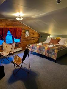 Ένα ή περισσότερα κρεβάτια σε δωμάτιο στο Gästis Lodge Vemdalen