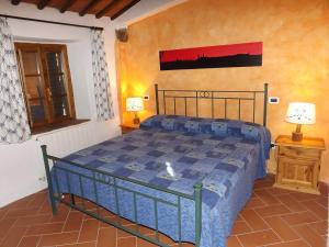 Voodi või voodid majutusasutuse Dimora nel Chianti toas