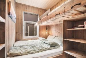 En eller flere senge i et værelse på Exclusive cottage - Ski in ski out!