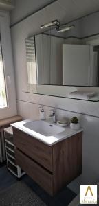 a bathroom with a sink and a mirror at Residence Appartamenti Casa Vacanze Abbazia in Pesaro +40 photos
