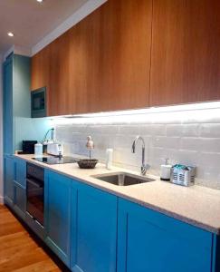 Η κουζίνα ή μικρή κουζίνα στο Apartamento Santa Ana +17 φωτογραφίες