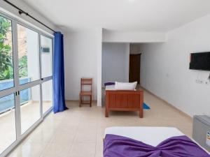 TV a/nebo společenská místnost v ubytování Residencial Mãe Nona